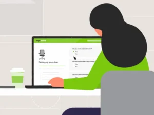 Animated explainer still showing employee using ErgoAssess ergonomic assessment tool on laptop, created for Sydney-based company Ergoworks